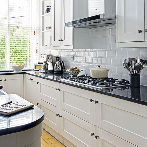 Cooking area | Light and entertaining kitchen | PHOTO GALLERY | Beautiful Kitchens | Housetohome.co.uk White Kitchen Black Worktop, Black Tiles Kitchen, Kitchen Lighting Layout, Traditional Kitchen Decor, Metro White, Kitchen Decor Lighting, Trendy Kitchen Tile, White Cupboards, Kitchen Black