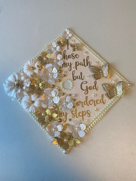 Hi everyone! this graduation cap topper is the perfect addition to your special day! It is made with heavy glitter card stock and permanent vinyl for the text. The paper flowers are all handmade by me and are what make my graduation cap toppers unique and elegant. This cap is made of high quality, durable materials that will keep you sparkling throughout your special day! How to attach to your graduation cap: There are double sided adhesive strips on the back, just peel off the backing and stick Its Been A Long Time Coming Grad Cap, Graduation Cap Designs Yellow, Graduation Cap Designs Parents, Cap Decoration Graduation Christian, God Graduation Cap Ideas, Christian Graduation Cap Ideas, Baddie Graduation Cap, Girly Graduation Cap, Unique Graduation Cap Designs