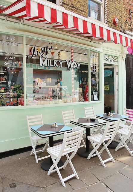 Issy's Milky Way | Islington, London I love the colors and simplicity.  Also a place I could see myself taking Elie! Islington London, Outdoor Cafe, Shop Fronts, Bakery Shop, Shop Front, London Town, Cafe Shop, Ice Cream Shop, Cafe Design