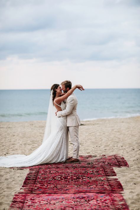 Red rugs, boho wedding, beach wedding, beach elopement, rug aisle Beach Wedding Rug Aisle, Beach Elopement Ideas, Small Beach Weddings, Beach Wedding Arch, Beach Wedding Aisles, Bohemian Beach Wedding, Small Weddings Ceremony, Wedding Sand, Beige Wedding