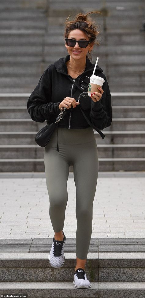 Sporty: Michelle Keegan showcased her gym-honed figure as she headed out in sportswear to pick up a coffee in Manchester on Friday Marvin Humes, Khaki Leggings, Mark Wright, Michelle Keegan, Sporty Outfits, White Trainers, Black Sunglasses, Miley Cyrus, Our Girl