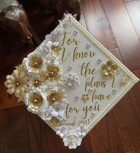 Hi everyone! this graduation cap topper is the perfect addition to your special day! It is made with heavy glitter card stock and permanent vinyl for the text. The paper flowers are all handmade by me and are what make my graduation cap toppers unique and elegant. This cap is made of high quality, durable materials that will keep you sparkling throughout your special day! How to attach to your graduation cap: There are double sided adhesive strips on the back, just peel off the backing and stick For I Know The Plans I Have For You Cap, God Inspired Graduation Cap, Grad Cap Scripture, Graduation Cap Designs Jeremiah 29:11, God Is Within Her She Will Not Fail Grad Caps, Grad Cap Inspo Christian, Graduation Cap Designs Scriptures, God Is Within Her She Will Not Fail Graduation Cap, White And Gold Grad Cap