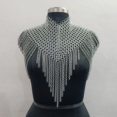 ❋ Chainmail Tops Now on Sale! ✨ Elevate your look with our stunning chainmail tops, now available at a special price! These unique pieces add a touch of metallic flair to any outfit, perfect for festivals, renaissance fairs, or everyday wear. • Website Link in Bio #chainmailtop #metallicfashion #festivalstyle #renaissancefair #statementpiece #shopnow Chain Mail Bag, Female Chainmail Armor, Chainmail Clothing Diy, Chainmail Accessories, Fantasy Chainmail, Chainmail Collar, Chainmail Projects, Chain Mail Shirt, Chainmail Clothing