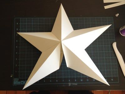 Paper Gold Star Tree Topper : 7 Steps (with Pictures) - Instructables Gold Star Tree Topper, Origami Tree, Cardboard Tree, Diy Tree Topper, Sheet Music Crafts, Christmas Tree Star Topper, Cool Calendars, Toppers Diy, Diy Christmas Tree Topper