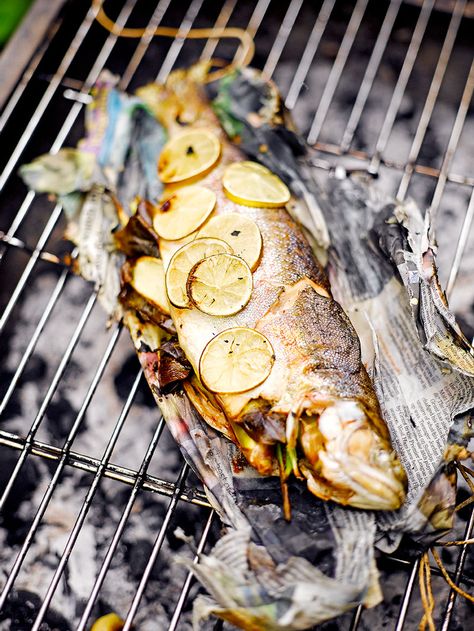 Barbecued Trout in Newspaper | Fish Recipes | Jamie Oliver Barbecued Fish, Barbecue Fish, Grilled Trout, Best Bbq Recipes, Bbq Fish, How To Cook Fish, Best Bbq, Barbecue Recipes, On The Grill