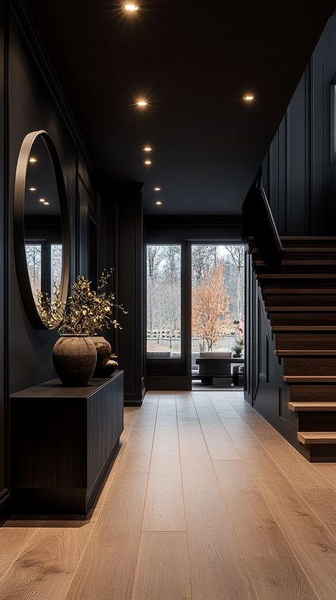 Inspiring Dark Hallway Design Ideas for a Cozy and Elegant Home - Remodr House Interior Dark Colors, Dark Moody House Aesthetic, Townhome Interior Designs, Black Walls And Trim, Black Interior Home Design, Moody House Aesthetic, Rooms Painted Black, Dark Aesthetic House Interiors, Entry Way Decoration Ideas