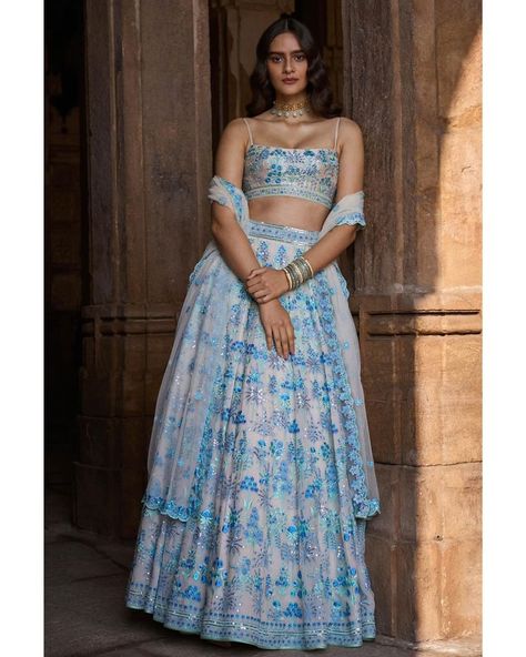 OGAAN INDIA on Instagram: “Anita Dongre’s new collection featuring pretty floral prints and sequinned embellishments for a simple yet striking look ✨ Shop on…” Anita Dongre Lehenga, Lehenga Choli For Wedding, Choli For Wedding, White Lehenga, Georgette Lehenga, Choli Blouse, Anita Dongre, Indian Bridal Dress, Luxury Wedding Dress