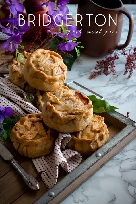 Bridgerton: Pork Meat Pies - Feast of Starlight Ren Faire Food, Hobbit Desserts, Bookish Recipes, Savory Strudel, Whimsical Recipes, Bridgerton Food, Dnd Recipes, Bridgerton Recipes, Literary Recipes