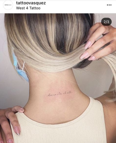 Tattoo Despite It All, And Despite It All Tattoo, Back Of Neck Tattoo Words, Despite Tattoo, And Here You Are Despite It All Tattoo, Women Back Of Neck Tattoo, Back If Neck Tattoos Women, Tattoo On The Back Of The Neck, Being Strong Tattoos