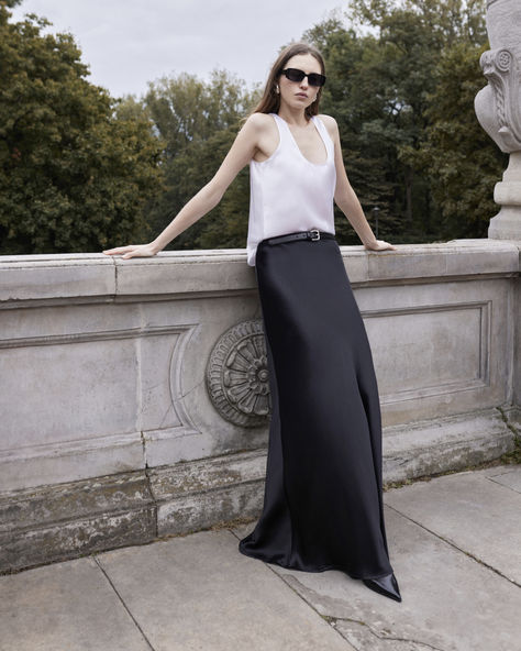 #moye #maxiskirt #satinskirt #longskirt #silkskirt #tanktop #whitetop #silktop Maxi Skirt Photoshoot, Chic Silk Maxi Skirt Floor-length, Elegant Satin Floor-length Maxi Skirt, Fitted White Satin Maxi Skirt, Luxury Sleek Full-length Maxi Skirt, Silk Maxi Skirt, Satin Skirt, Silk Skirt, White Tank