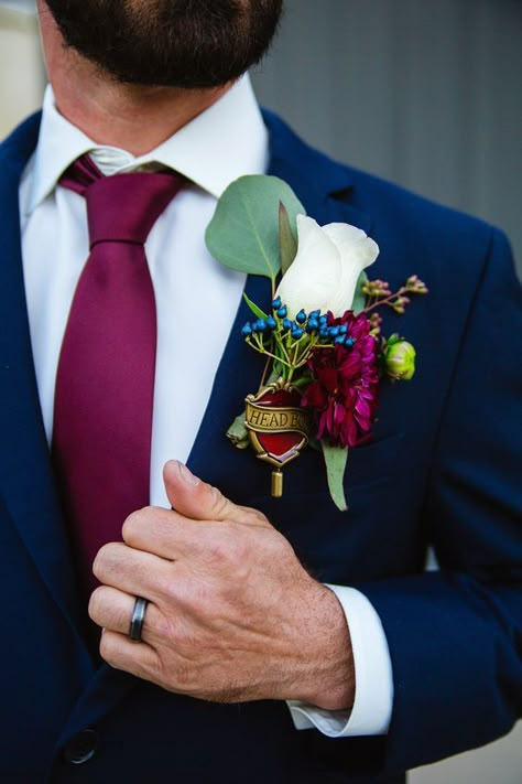 Navy Blue + Magenta + Green Jewel Tones Wedding Color Ideas 2024: magenta bridesmaid dresses, white bridal gown, magenta and green bouquets, navy blue groomsmen suits and magenta ties, navy blue wedding tablecloth and bouquet ribbons. Look for more jewel tones wedding inspiration! Jewel Toned Wedding Groomsmen, Jewel Tone Ties Groomsmen, Jewel Tone Mens Suit, Jewel Tone Wedding Tuxedo, Jewel Tone Suit Groom, Jewel Tone Wedding Mens Attire, Groomsmen Jewel Tone, Harry Potter Boutonniere, Groomsmen Attire Jewel Tones