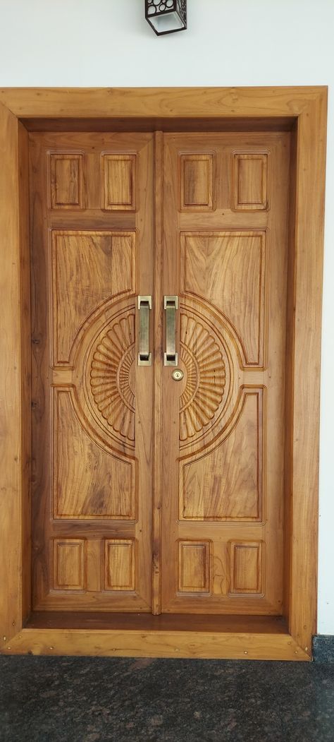 Traditional type teak wood double door design Double Door Entrance Teak Wood, Teak Double Door Design, Wooden Double Front Doors Entrance, Teak Wood Double Door Design, Main Double Door Design Wood, Teak Door Design, Wooden Main Double Door Design, Double Door Design Wood, Teak Wood Main Door Design