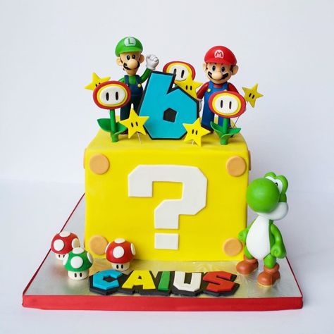 Looking for Super Mario Cake Designs? We list 15 insanely cute Mario birthday cakes that are perfect for your themed party. Take a look, you will find a couple that you will absolutely love Super Mario Bros Party Ideas, Mario Kart Party, Mario Bros Birthday Party Ideas, Mario Birthday Cake, Mario Bros Cake, Super Mario Cake, Super Mario Bros Birthday Party, Mario E Luigi, Super Mario Bros Party