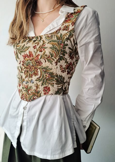 corset top flower woven, white button up shirt, pleated green pants, pearl jewelry Corset And Button Down, Corset Top Layered Outfit, Vintage White Skirt Outfit, Corset Over White Button Down, White Corset Outfit Ideas, Dress On Top Of Shirt, Button Up Corset Outfit, Corsets For Women, Shirt And Top Outfit