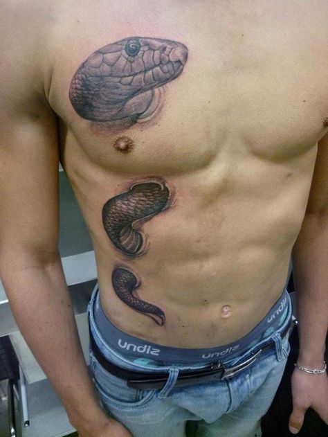 25 Hypnotizing Tattoos That Are Too Stunning for This World #tattooremovalfacts Mens Tattoos Back, Cross With Snake, A Snake Tattoo, Tato 3d, Blood Tattoo, Cobra Tattoo, Mens Tattoos, Tattoos Black Women, Hyper Realistic Tattoo