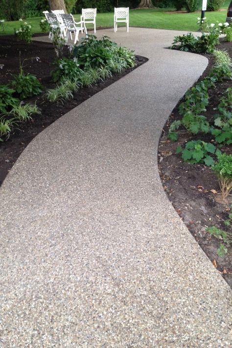 Exposed aggregate patio in Indiana by Hanson Pool Wedding Decorations, Aggregate Patio, Exposed Aggregate Concrete, Concrete Path, Patio Grande, Walkway Landscaping, Walkway Design, Exposed Aggregate, Pool Wedding