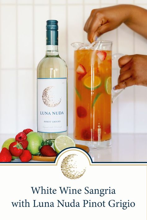 Person stirring batch of white wine sangria in pitcher and a bottle of Luna Nuda Pinot Grigio Pinot Grigio Sangria, White Sangria Recipe, White Wine Sangria, Wine Sangria, White Sangria, Sangria Recipes, Club Soda, Pinot Grigio, Drink Dispenser