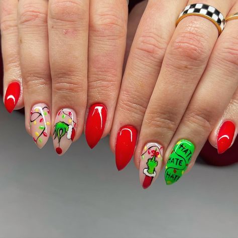 Posted by Zoe Scott: Welcome to the world of Grinch Nail Designs, perfect for adding a whimsical touch to your holiday season style. Covering a range of styles from minima... Grinch Almond Nails, Buddy The Elf Nails, Grinch Nails Designs Easy, Grinch Themed Nails, Grinch Nail Ideas, Grinch Inspired Nails, The Grinch Nail Art, Simple Grinch Nails, The Grinch Nails