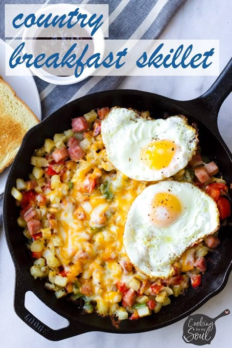 Delicious Country Breakfast Skillet! This e aasy breakfast skillet recipe calls for diced potatoes, bell peppers, ham, and cheese. It's so comforting, filling, and fun to eat. Put an egg on it! #breakfastskillet #potatoes #castironskilletbreakfast #cookingformysoul | cookingformysoul.com Easy Breakfast Skillet Recipes, Country Breakfast Skillet, Easy Breakfast Skillet, Breakfast Skillet Recipes, Country Breakfast, Frozen Potatoes, Breakfast Skillet, Skillet Cooking, Skillet Recipes