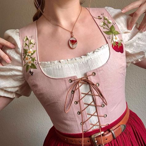 Walking Through Woodlands 🌿 | The Strawberry Corset Top 🍓*SOLD* This corset top is the perfect ode to one of spring's dearest delights: the humble but ever-lovely… | Instagram Ren Faire Outfits Cottagecore, Hobbitcore Accessories, Corset Outfit Cottagecore, Pink Ren Faire Outfit, Cottagecore Bodice, Ren Fair Outfits, Strawberry Cosplay, Corset With Dress, Strawberry Corset