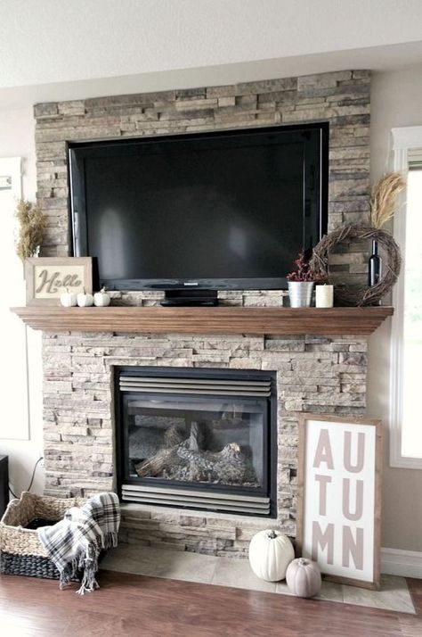 Ideas for Decorating Around a TV Over the Fireplace Mantel, stone mantel with decor via Love Create Celebrate Dream House Living Room, Entertainment Center Decor, Ideas Hogar, Fireplace Remodel, Trendy Living Rooms, Home Fireplace, Fireplace Makeover, Living Room Remodel, Living Room Flooring