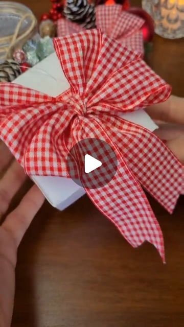 1.8M views · 46K likes | The Joy Party on Instagram: "Christmas bow  @dicasdasuy #Christmas #Christmasidea #Christmasbow #howtomakeabow #bowtutorial #crafting #craftingideas #craftingismytherapy #craftingtime #handmade #homemade #ribbonsandbows #ribbons #christmasdecor #Diwali #redbow #hairbow #bowtutorials" Fabric Christmas Bows Diy, Christmas Present Bows Diy Ribbons, How To Make Bows For Christmas Presents, Easy Gift Bow, How To Make Big Christmas Bows, Gift Basket Bows Diy, Christmas Bows Diy Tutorials Videos, Present Bows Diy Ribbons, How To Make A Simple Bow With Ribbon