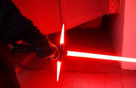 The new Red Lightsaber of the secret Sith in upcoming 'Episode VII: The Force Awakens' Crossguard Lightsaber, Sith Aesthetic, Sith Lightsaber, Sith Warrior, Red Lightsaber, Star Wars Colors, Jedi Sith, Star Wars Fashion, Ben Solo