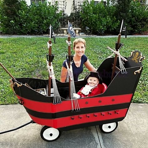 Jolly Roger Wagon Pirate Ship Wagon Pirate Ship, Pirate Ships Diy, Wagon Floats, Wagon Costume, Cardboard Pirate Ship, Disney Tutu, Pirate Props, Wagon Ideas, Cardboard Boat