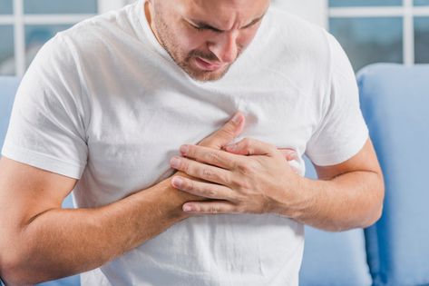 Close-up of a man with heart attack symptoms touching his heart with two hands Photo | Free Download Ways To Lower Cholesterol, Penyakit Jantung, Cardiac Disease, Medical Consultation, Guard Your Heart, Best Hospitals, Shortness Of Breath, Chest Pain, Jumping Jacks