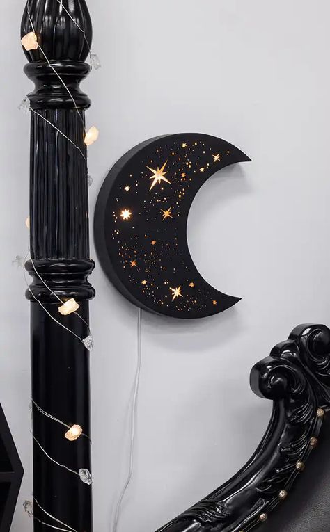 This gorgeous crescent moon celestial lamp has been designed with stars of different sorts to depict the magic of the night sky. This lamp has a hook to hang on any wall to add a lush magical light to any room. It runs on a USB cable to make it easy to keep going without the environmental nightmare of using batteries. The beautiful warm soft glow from these helps create a relaxing atmosphere and adds a bit of celestial magic to any room. Dimensions: 24.8cm x 21cm x 3.7cm Made from wood. Celestial Lamp, Celestial Room, Halloween Living Room Decor, Halloween Living Room, Modern Boho Bedroom, Magical Light, Halloween Room, Celestial Magic, Dark Home