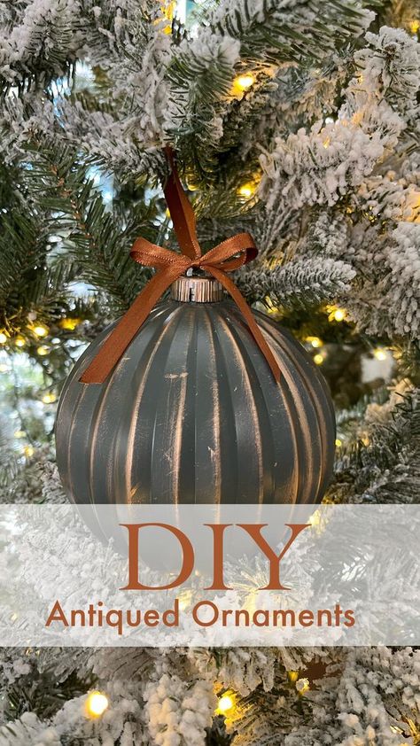 DIY antiqued ornaments? Yes please! I used large pink bulbs I found @hobbylobby for 60% off for these and I love how they turned out! • I spray painted these in Satin Italian Olive from @krylonbrand. It’s the first time I’ve used their spray paints actually and I LOVE it. This color is 😍😍😍 After they dried, I used antique gold Rub n buff and antiqued them in spots where distressing would normally occur. Finished them off with some ribbon and tied them into cute lil’ bows. 🎀 Easy peasy and oh Rub N Buff Ornaments, Rub N Buff Christmas Ornaments, Rub N Buff Ideas, Spray Paint Ornaments, Ornament Makeover, Gold Rub N Buff, Wicked Christmas, Tassel Tree, Moody Christmas