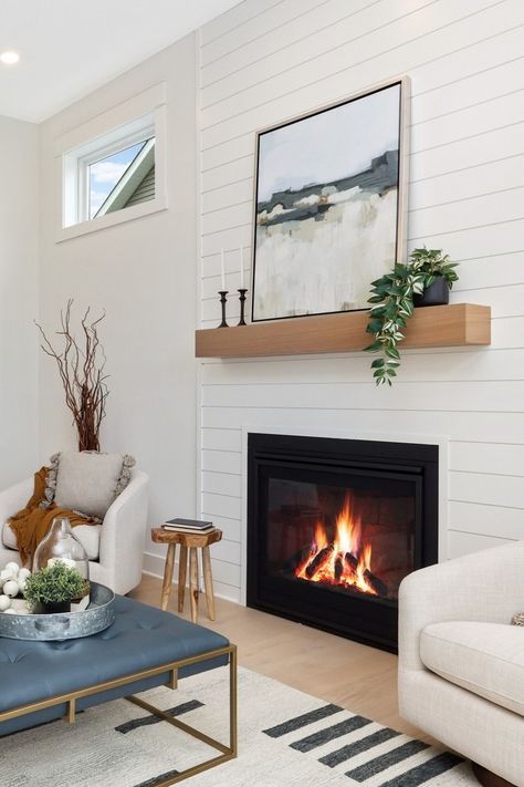 Fireplace, shiplap, white living room, floating mantle, square coffee table, coastal interior design. Fireplace Ideas Simple, Coastal Cottage Fireplace, Floating Mantle Fireplace, White Shiplap Fireplace, Coastal Fireplaces, Coastal Fireplace Ideas, Coffee Table Coastal, Fireplace Shiplap, Cottage Airbnb