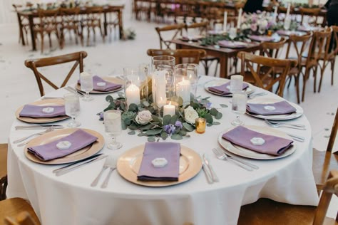 Candle centerpiece with eucalyptus and lavender flowers for the White Sparrow wedding. Megan Kay Photography. Purple Place Setting Wedding, Lilac And Sage Wedding Centerpieces, Lilac Wedding Centerpieces, Lavender Flower Centerpieces, Purple Flowers For Wedding, Centerpiece With Eucalyptus, Centerpiece Eucalyptus, Lavender Wedding Centerpieces, Lavender Wedding Decorations