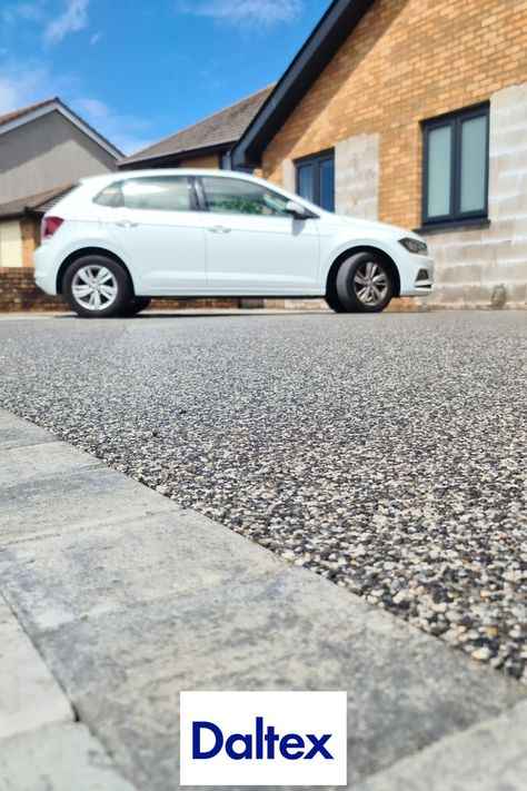 This spectacular mix of light and dark grey aggregates with white stones added to the combination creates Daltex Bespoke Blend, Ocean Pearl. A gorgeous yet subtle option for Resin Driveways and other exterior surfacing. Fantastic Installation by SRS Surfacing! Resin Bound Driveways, Resin Driveway, Patio Garden Design, White Stone, Driveway, Dark Grey, Bespoke, Patio Garden, Light In The Dark