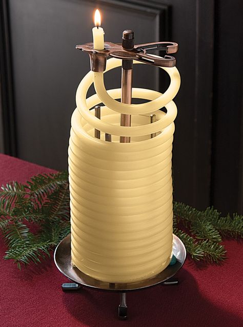 A sculptural, cleanburning candle based on a design from the 1600s. Decide how long you want it to burn (1" = about 25 min.), then feed the coil through the clip. When the candle burns down, the clip snuffs the flame. 5" diameter, 10" high. Burns about 80 hours. Specify Natural, Red (cinnamon scent), or Green (spruce scent). Coil Candle, Unusual Candles, Cinnamon Scent, Candle Base, Salt Lamp, Wax Candles, The Flame, Best Candles, Beeswax Candles