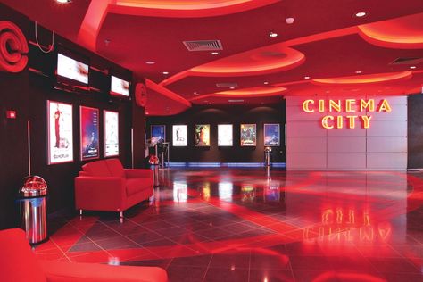 Cinema City in 'Transylvania' (Romania) Movie Theater Lobby, Theater Lobby, Modern Theatre, Auditorium Design, Theatre Inspiration, Cinema Design, Theatre Interior, Hollywood Cinema, Modern Office Design