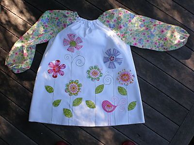 downloadable art smock pattern. I think I'll make one with added pockets for the grands. Art Smock Pattern, Kids Art Smock, Smock Pattern, Kid Quilts Patterns, Joseph's Coat, Art Smock, Bat Man, Pillow Tutorial, Sewing Projects For Kids