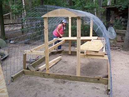 Our first chicken coop was a typical square building with a front glass window and a side door to walk into. I was proud of accomplishing a building for my feathered drumsticks, although chagrined when I found out the county would tax it, since, "two walls and a roof make a building", and all buildings are improvements on the property.....I also learned the wisdom in the words, "it's easier to build anew, than to rebuild", when a hurricane dropped a tree on my chicken coop. So it was t… Old Chicken Coop, Build Your Own Chicken Coop, Cheap Chicken Coops, Urban Chicken Farming, Chicken Roost, Easy Chicken Coop, Portable Chicken Coop, Types Of Chickens, Urban Chickens