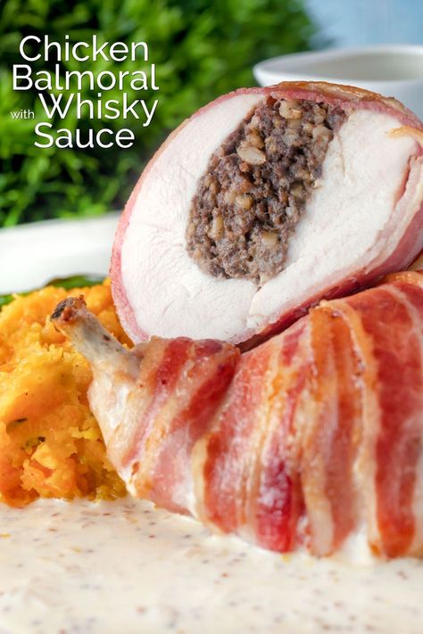 Chicken Balmoral is a relatively modern Scottish recipe that features breast stuffed with haggis, then wrapped in bacon before being roasted. It is served with a delicious whisky cream sauce and whilst preparation takes a little while cooking the dish takes just 40 minutes! Balmoral Chicken Recipe, Chicken Balmoral Recipe, Uk Dinner Recipes, Scottish Christmas Dinner, Haggis Recipes, Balmoral Chicken, Scottish Party, Haggis Recipe, Vegetarian Haggis