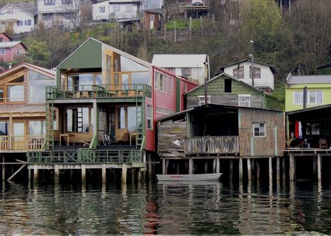 Chilean island of Chiloe - Panama Canal known for its waterfront stilt houses which have been converted into colorful hotels, coffee shops, and artisan co-ops. Stilt House, Stilt Cabin, Tiny Stilt House, Coastal Stilt Home Plans, House On Stilt, Stilt Houses, Pier House, Sea House, House On Stilts