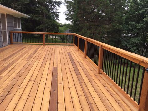 Gorgeous cedar deck! | Deck Masters, LLC Cedar Deck Stain, Natural Cedar Stain, Deck Fascia, Metal Balusters, Cedar Stain, Wallpaper Removal, Cedar Posts, House Concept, Cedar Deck