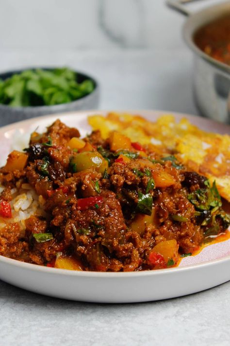 Savor the comforting flavors of our classic Puerto Rican Picadillo. This traditional Latin dish combines seasoned ground beef, olives, raisins, and aromatic spices for a perfect weeknight dinner. #thedailyspeshyl #puertoricancuisine #easydinnerrecipe #weeknightdinner #picadillo Puerto Rican Empanadas Beef, Puerto Rican Spaghetti, Puerto Rican Pinchos, Puerto Rican Picadillo Recipe, Easy Puerto Rican Recipes, Puerto Rican Picadillo, Puerto Rican Empanadas, Traditional Puerto Rican Food, Puerto Rican Appetizers