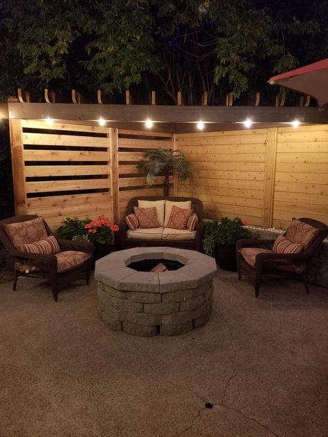 Fenced In Fire Pit Area, Corner Pergola Fire Pit, Fire Pit Privacy Ideas, Backyard Corner Fire Pit Ideas, Fire Pit Sitting Area Ideas Diy, Corner Yard Fire Pit Ideas, Small Patio Fire Pit, Corner Backyard Landscaping, Corner Fire Pit Ideas