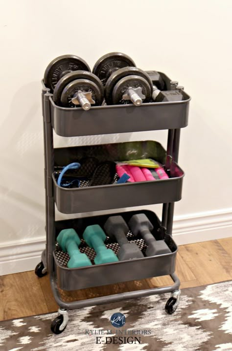 Mini home gym storage ideas for weights, Ikea hack Raskog unit. Kylie M E-design Tiny Home Gym Corner, At Home Workout Area, Physio Office, Diy Yoga Room, Small Workout Room Ideas, Workout Nook, Home Gym Storage Ideas, Gym Storage Ideas, Gym Corner