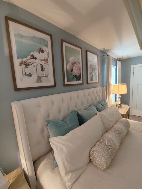 Santorini Benjamin Moore, Bedroom With Light Blue Accents, How To Decorate A Bedroom With Blue Walls, Blue Bedroom Lighting, Master Bedrooms Light Blue, Light Blue And Gold Home Decor, Blue Wall Master Room, White Bed Blue Walls, Light Blue Painted Bedroom