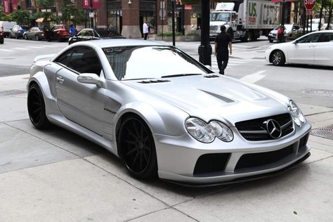 A 6.3 Litre V8, 630 Nm of torque road-going race car sums up this early 2000's Mercedes-Benz CLK63 AMG Coupe. Virtually zero body roll, too! 
#LuxuryMotorPress #MercedesBenz #CLK63 #AMG 2000s Mercedes, Silver Mercedes Benz, Mercedes Clk Amg, Mercedes Benz Slk 350, 2000s Cars, Mercedes Benz Coupe, Singer Dr, Mercedes Clk, Mercedes Benz Slk