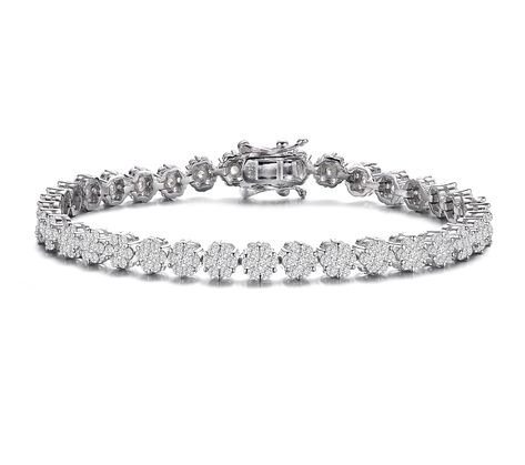 This bracelet is perfect for everyone who loves flowers. This tennis bracelet features clear round Cubic Zirconia clustered together to create a flower-design. Several pieces of clear marquise Cubic Zirconia are also added in the center to form a leaf-like design that complements the flower. This bracelet is set in Sterling silver with Rhodium plated and secures with a box clasp. Product should not come in contact with water Wipe to clean Box Clasp, Tennis Bracelet, Jewelry Bags, Bracelet Sizes, Flower Design, Luxury Jewelry, Womens Jewelry Bracelets, Rhodium Plated, Flower Designs