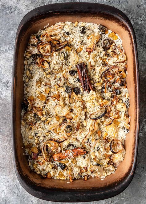 This basmati rice pilaf is oven baked with dried fruit, pine nuts and zaatar. Make this Middle Eastern recipe for a flavorful and easy side dish! #BasmatiRiceRecipes #BakedRicePilaf #LebaneseRecipes Middle East Rice, Oven Baked Basmati Rice, Baked Basmati Rice Recipes Oven, Oven Rice Pilaf, Baked Rice Pilaf Oven, Baked Rice Dishes, Middle Eastern Rice Dishes, Middle Eastern Basmati Rice Recipes, Middle Eastern Rice Pilaf