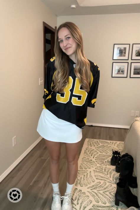 Game day outfit! I buy a S/M in men’s jerseys or an XL in juniors.   College football, college game day, football game outfit inspo, NFL game, NFL apparel, game day outfit, tailgate outfit, tailgate style, football fashion, game day looks, tennis skirt outfit, cute sweatshirt outfit, sporty chic  Follow my shop @CassMcK_ on the @shop.LTK app to shop this post and get my exclusive app-only content!  #liketkit #LTKfindsunder100 #LTKfindsunder50 #LTKSeasonal @shop.ltk https://liketk.it/4Pv1K How To Style Jerseys Football, Tailgating Outfits, Tailgate Outfit College, Outfit Sporty Chic, College Game Day Outfit, Football Game Outfit Highschool, Game Day Looks, Football Tailgate Outfit, Outfit Sporty