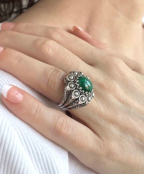 ✨ Unveil the elegance of earthy green hues with a twist of artisanal charm! Our 925 Sterling Silver Women's Ring is not just a piece of jewelry; it's a masterpiece, cradling a mesmerizing Malachite gemstone amid intricate filigree art. 💚 Perfect for adding a touch of sophistication to any outfit or gifting a loved one something truly unique! 💍 Each ring comes thoughtfully gift-boxed, ready to enchant. Click the link to add this handcrafted treasure to your collection or surprise someone spec... Silver Antique Rings, Antique Silver Ring, Embroidery Ring, Mothers Gifts, The Ring Face, Antique Silver Rings, Antique Silver Jewelry, Silver Polish, Dome Ring